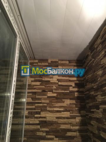 Отделка панорамной лоджии камнем