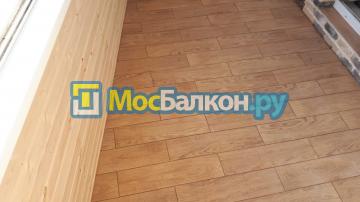 Ремонт лоджии с комбинированной отделкой камнем