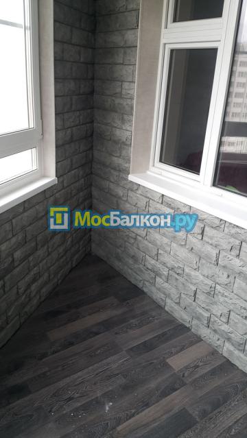 Комбинированная обшивка искусственным камнем 
